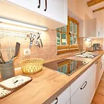 Strandschloesschen - Haushaelfte 1 Prázdninový dům *